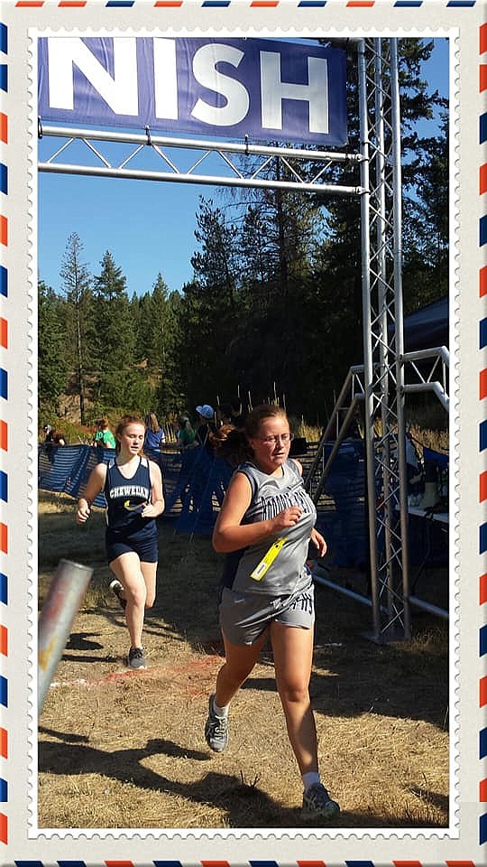 Photo by KATIE BOURASSA
Elizabeth Bourassa finishing the race.