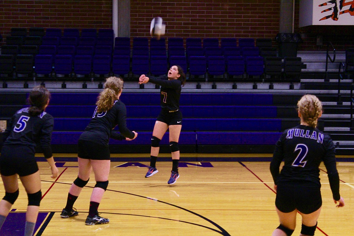 Photo by CHANSE WATSON
Mullan senior Sydnie Cote passes the ball during an intense rally in the Tigers-Miners matchup last week. Wallace won the road match in four sets.