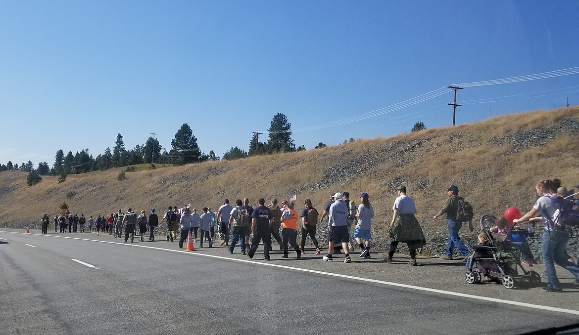 Photo by MANDI BATEMAN
The marchers heading down Highway 95.