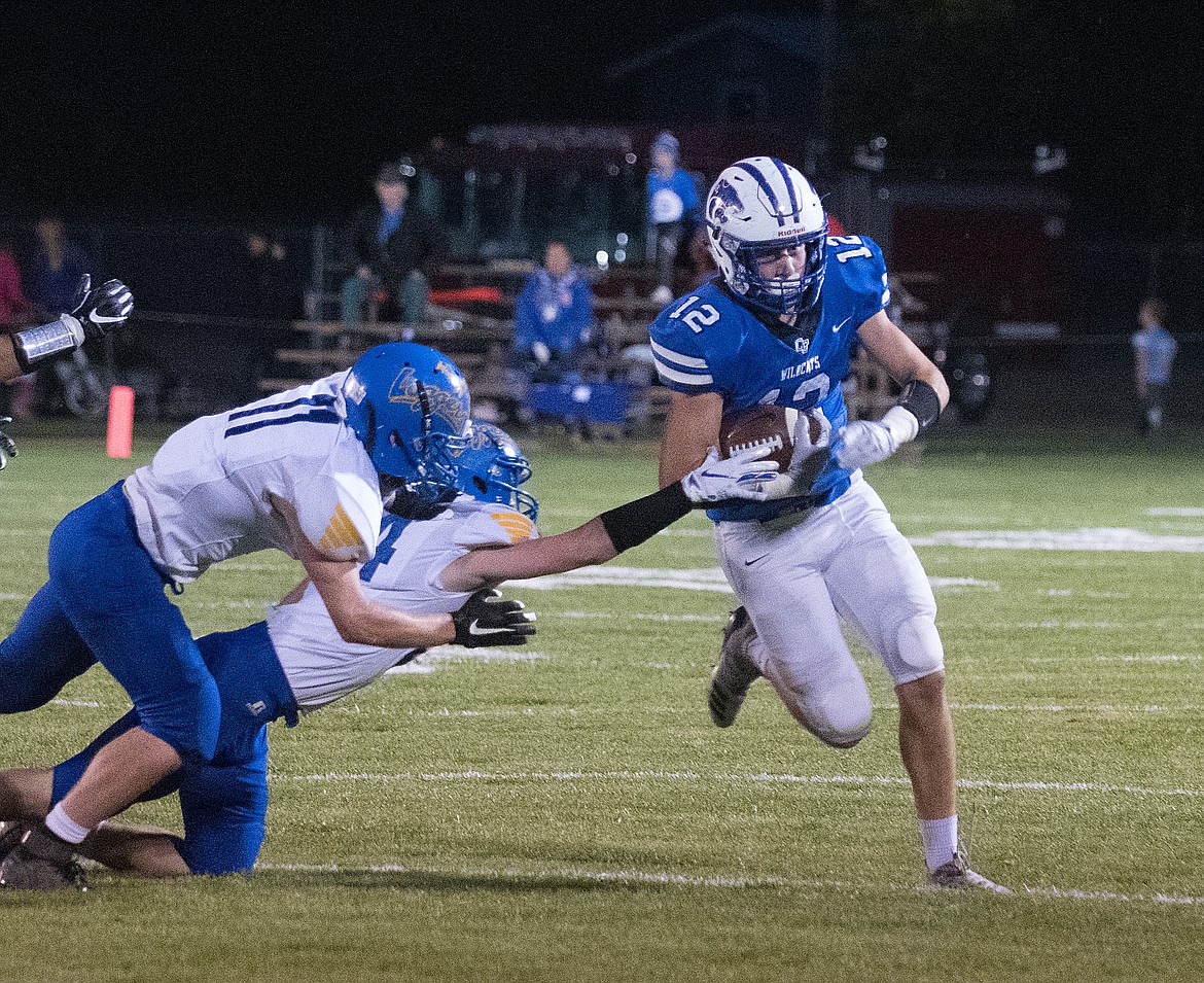 Parker Greene rounds the corner against Libby.