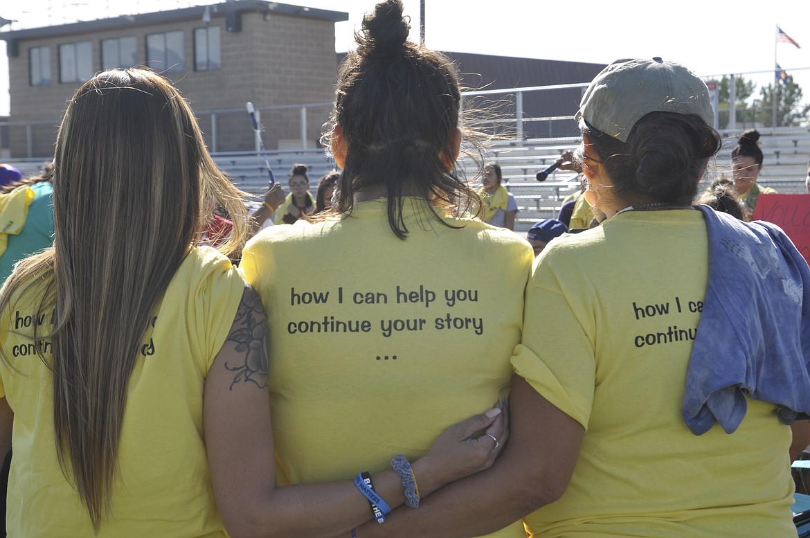 Participants in last Friday&#146;s suicide awareness walk wore yellow shirts in memory and support of those lost to suicide.