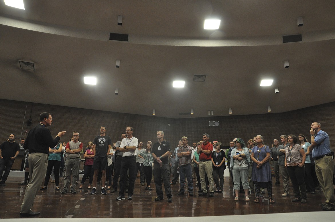 Polson Superintendent Rex Weltz, left, talks with Polson Middle School and High School faculty during a self-defense training Wednesday, Sept. 12. (Ashley Fox/Lake County Leader)