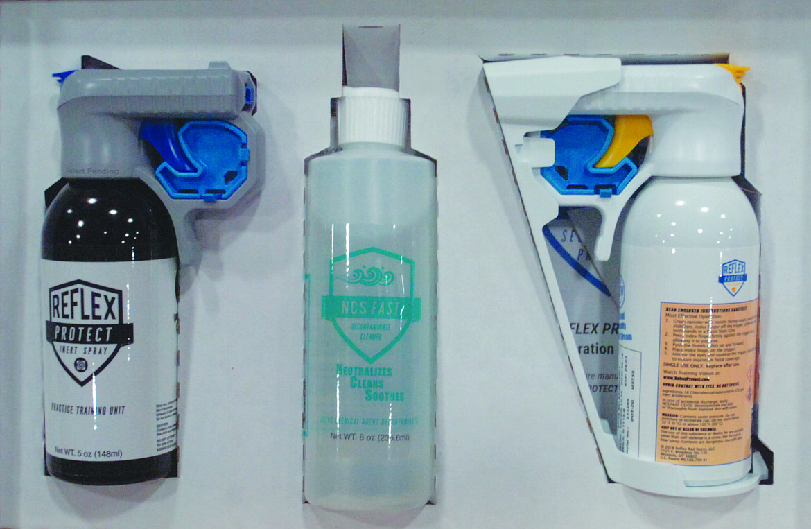 Pictured is a package containing Reflex Protect self defense spray, and NCS Fast. The latter is a spray that helps a person sprayed with recovery from the incident.