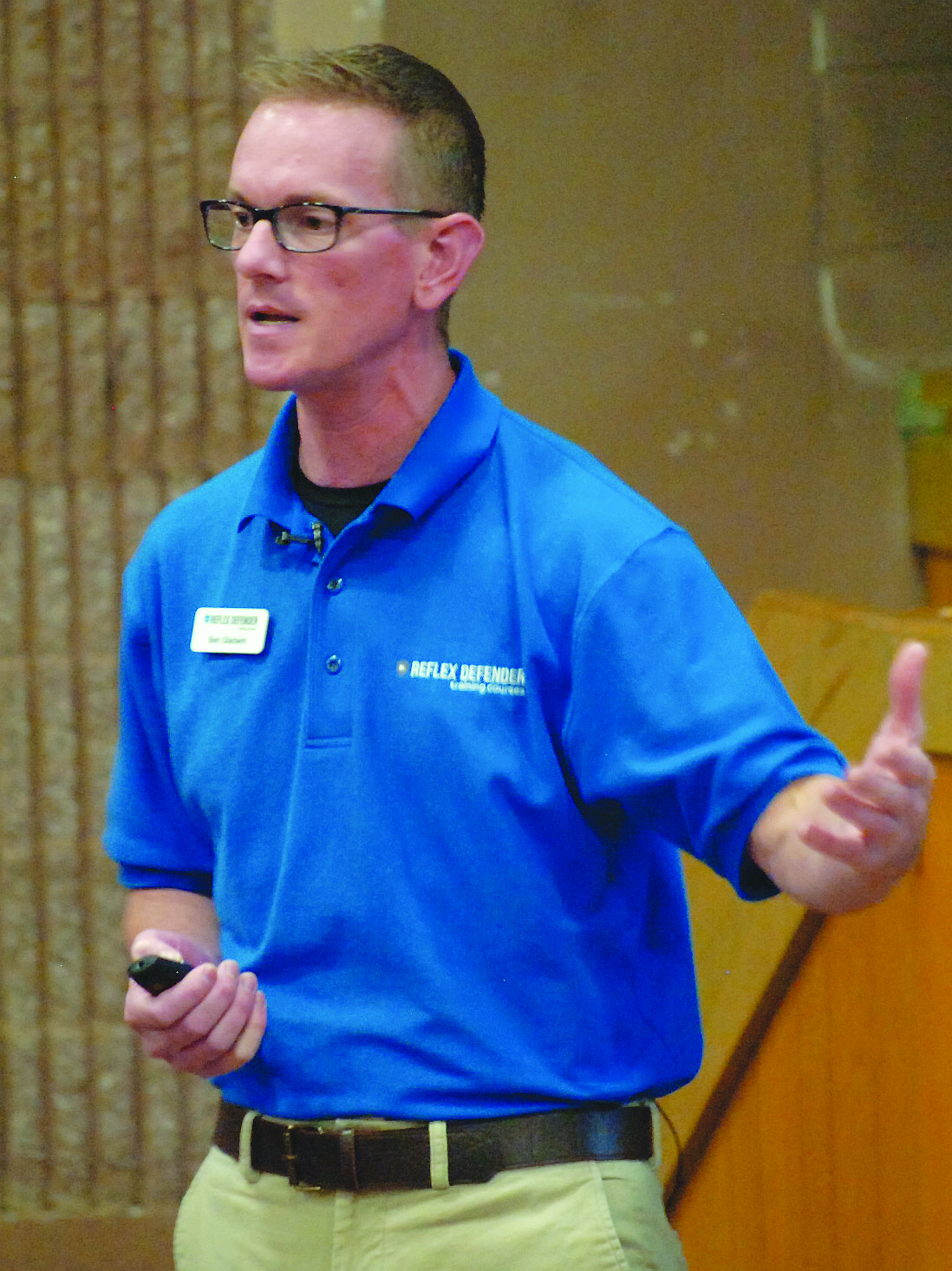 Ben Gladwin of the University of Montana Police Department speaks during a Reflex Protect information session at Polson High School.