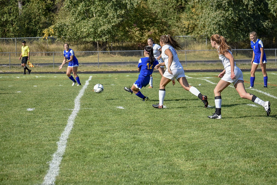 Libby junior midfielder Sydney Gier kicks in the game-winning goal that pulled the Lady Loggers into the lead with 16 minutes left in the second half during their 3-2 win against the Valkyries Saturday. (Ben Kibbey/The Western News)