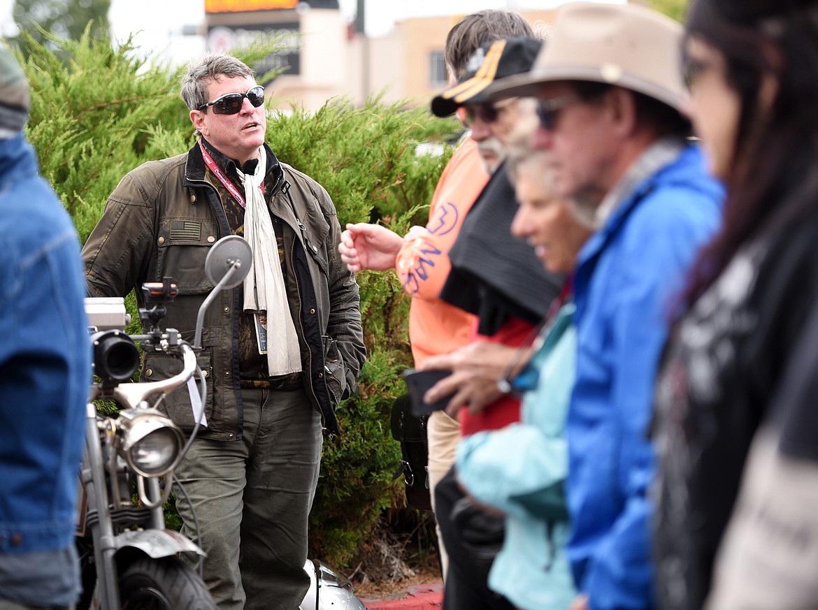 Erik Bahl of Huntsville, Alabama talking with fellow motorcycle enthusiasts on Thursday evening, September 20, at the Pre 1929 Motorcycle Cannonball Endurance Run checkpoint at the Red Lion Hotel. The run began in Portland, Maine and wraps up in Portland, Maine.(Brenda Ahearn/Daily Inter Lake)