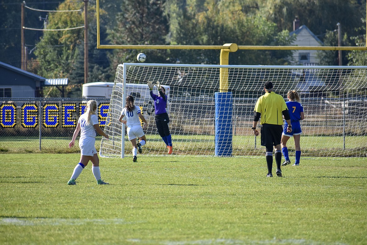 With minutes left in the first half and the score tied 2-2, Libby sophomore goalkeeper Bethany Thomas goes airborne for the save during the Lady Loggers&#146; 3-2 win against the Valkyries Saturday. (Ben Kibbey/The Western News)