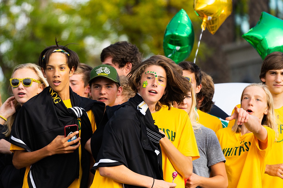 Members of the Bulldogs soccer teams participate in the homecoming parade.