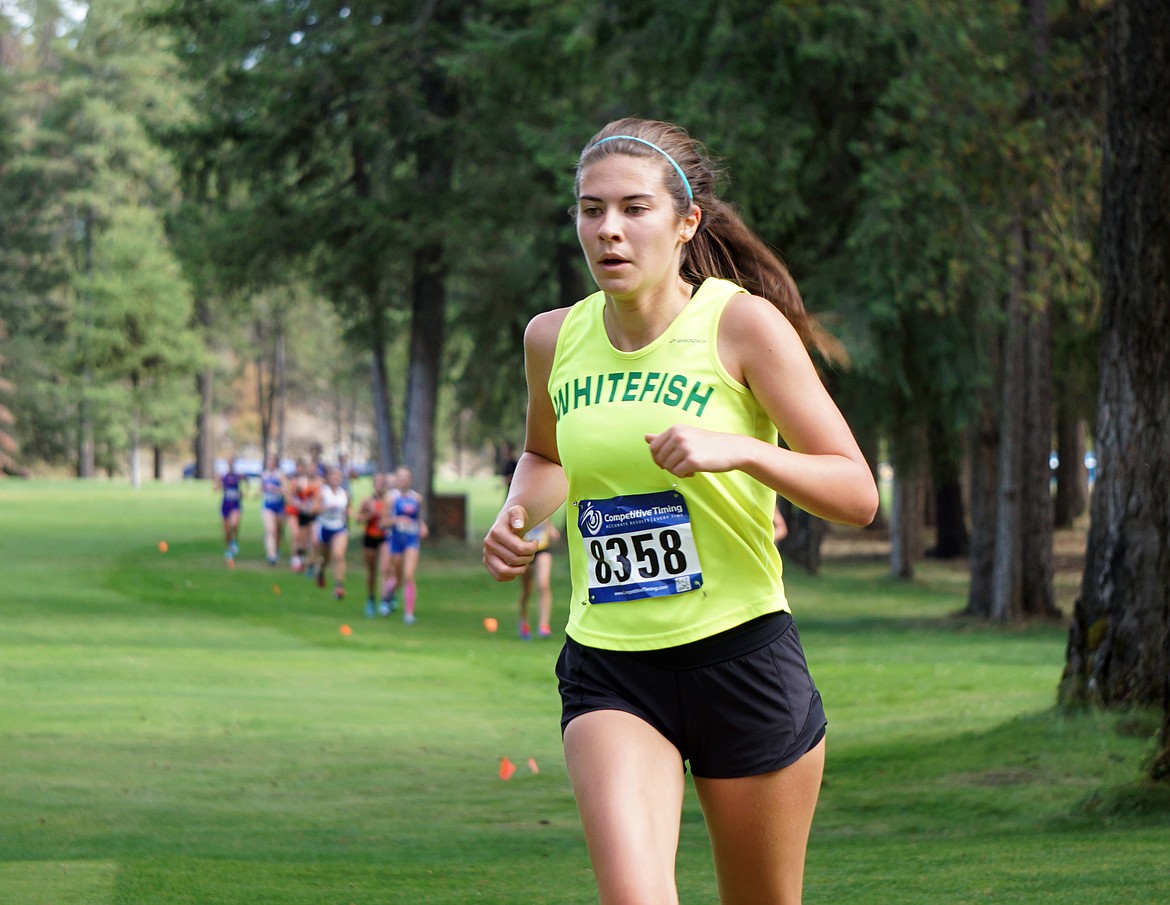 Bulldog Alie Simpson runs Thursday in the Thompson Falls Invite cross country race. (Matt Weller photo)