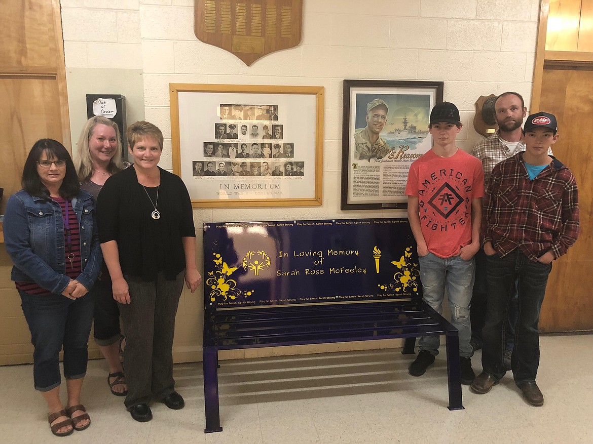 Photo by JOSH MCDONALD
The bench was built by members of the Kellogg High School metal shop. Pictured are some of the people who helped with the bench. From left are Julie Hansen; Jeanne Hendrix; Sarah&#146;s mother, Crystal Moore; Michael Senteney; Brandon Hoxie and Ashtyn Isais.