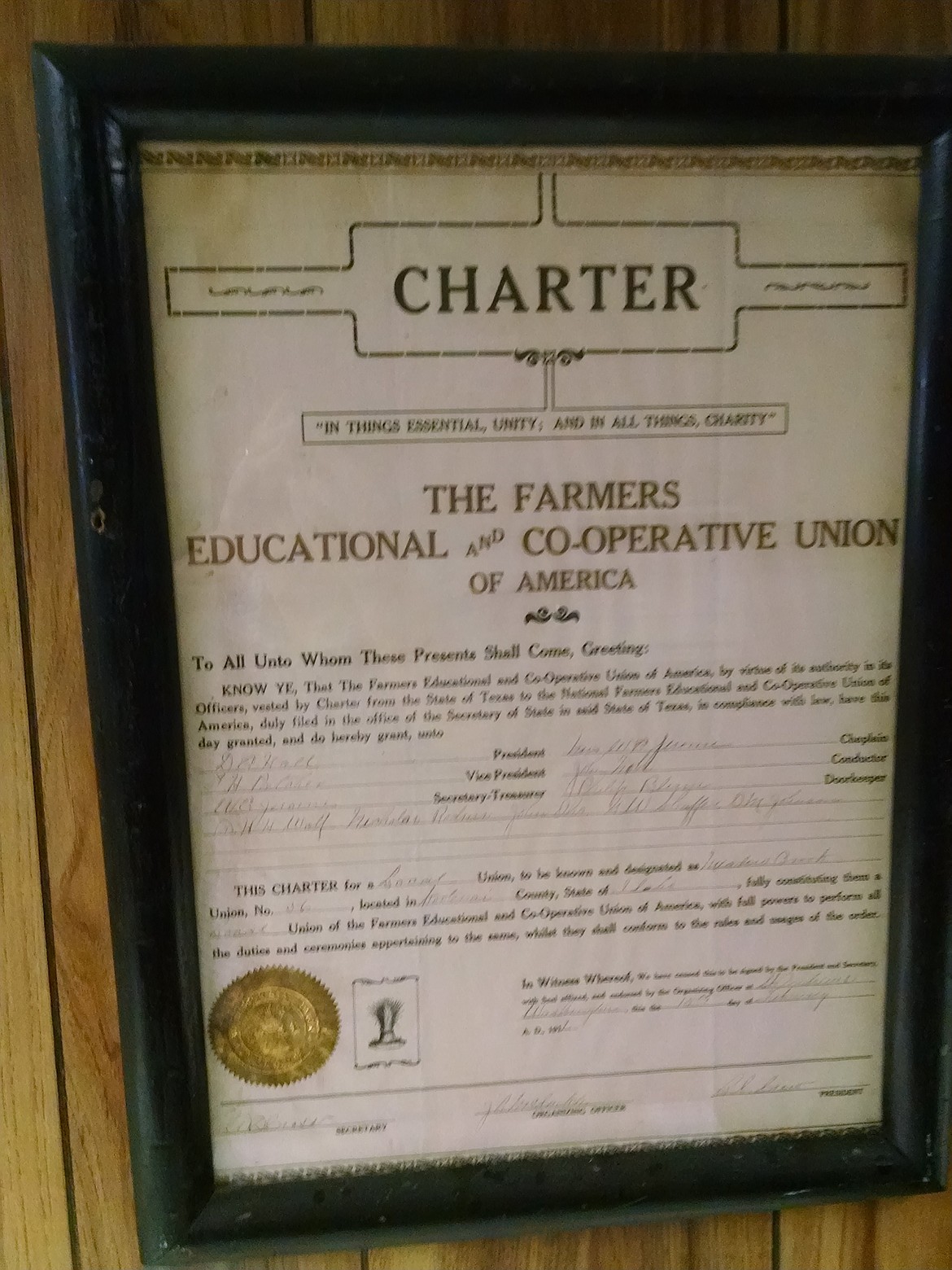 The 1912 Farmers and Educational and Co-operative Union of America charter that dissolved in 1968 is hung inside the Meadow Brook Community Hall. (BRIAN WALKER/Press)