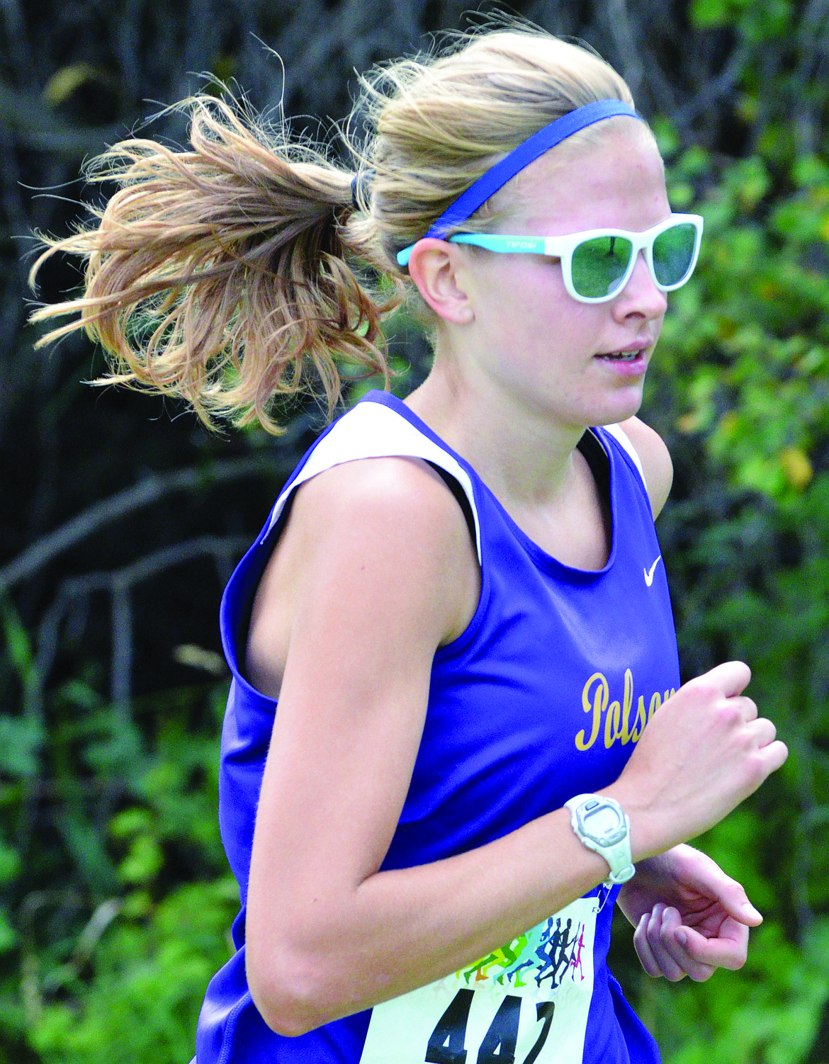 POLSON HIGH School runner Bea Frissell captures first-place at the Mission Duels Saturday afternoon at the Silver Fox Golf Course in Pablo. (Jason Blasco/Lake County Leader)