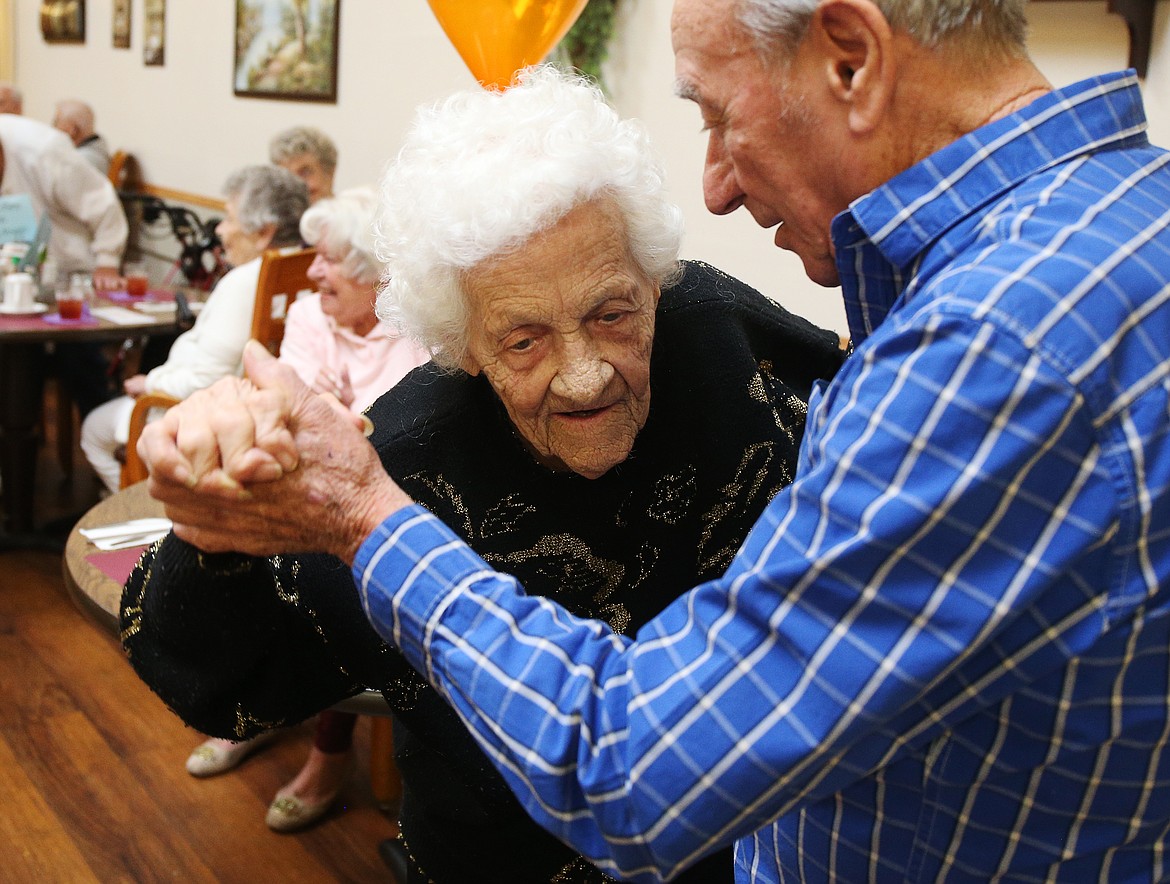 LOREN BENOIT/Press
Bestland Senior Independent Living resident Donna Morse dances with Rene Lariviere during her 99th birthday celebration on Thursday.