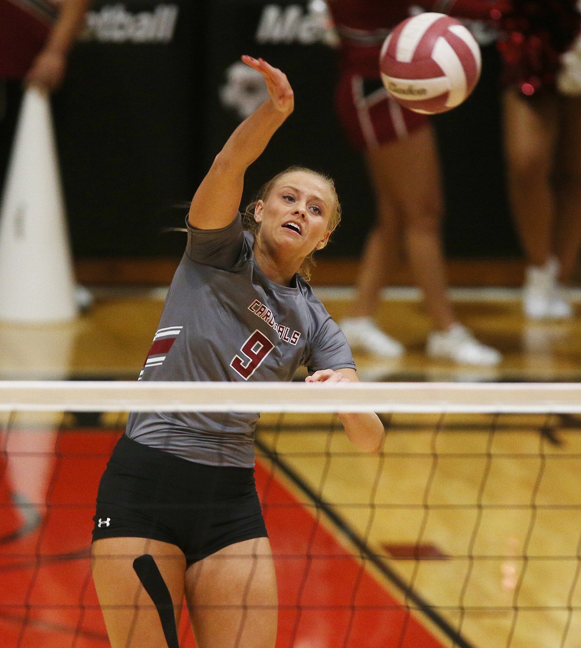 Kayla Neumann of North Idaho College hits a spike against Community Colleges of Spokane.