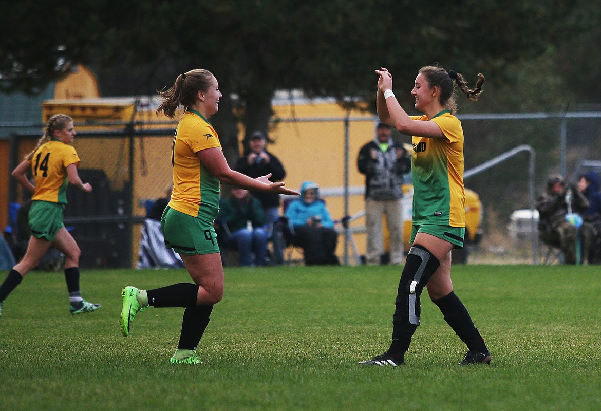 Lakeland&#146;s Sammi Penick, left, celebrates her first-half goal with Mia Maddy during Tuesday&#146;s match against Moscow at Sunrise Rotary Field in Rathdrum. (LOREN BENOIT/Press)