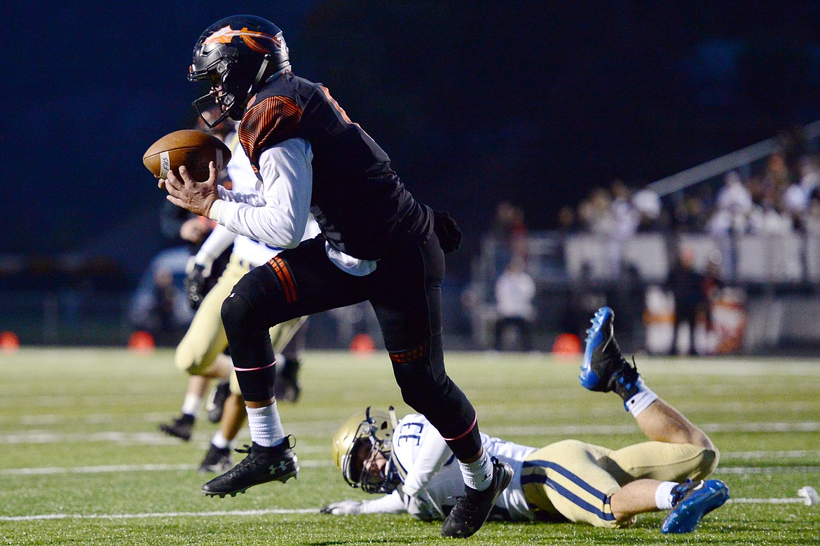 Flathead wide receiver AJ Jones heads to the end zone on a first quarter touchdown reception against Missoula Big Sky at Legends Stadium on Friday. (Casey Kreider/Daily Inter Lake)