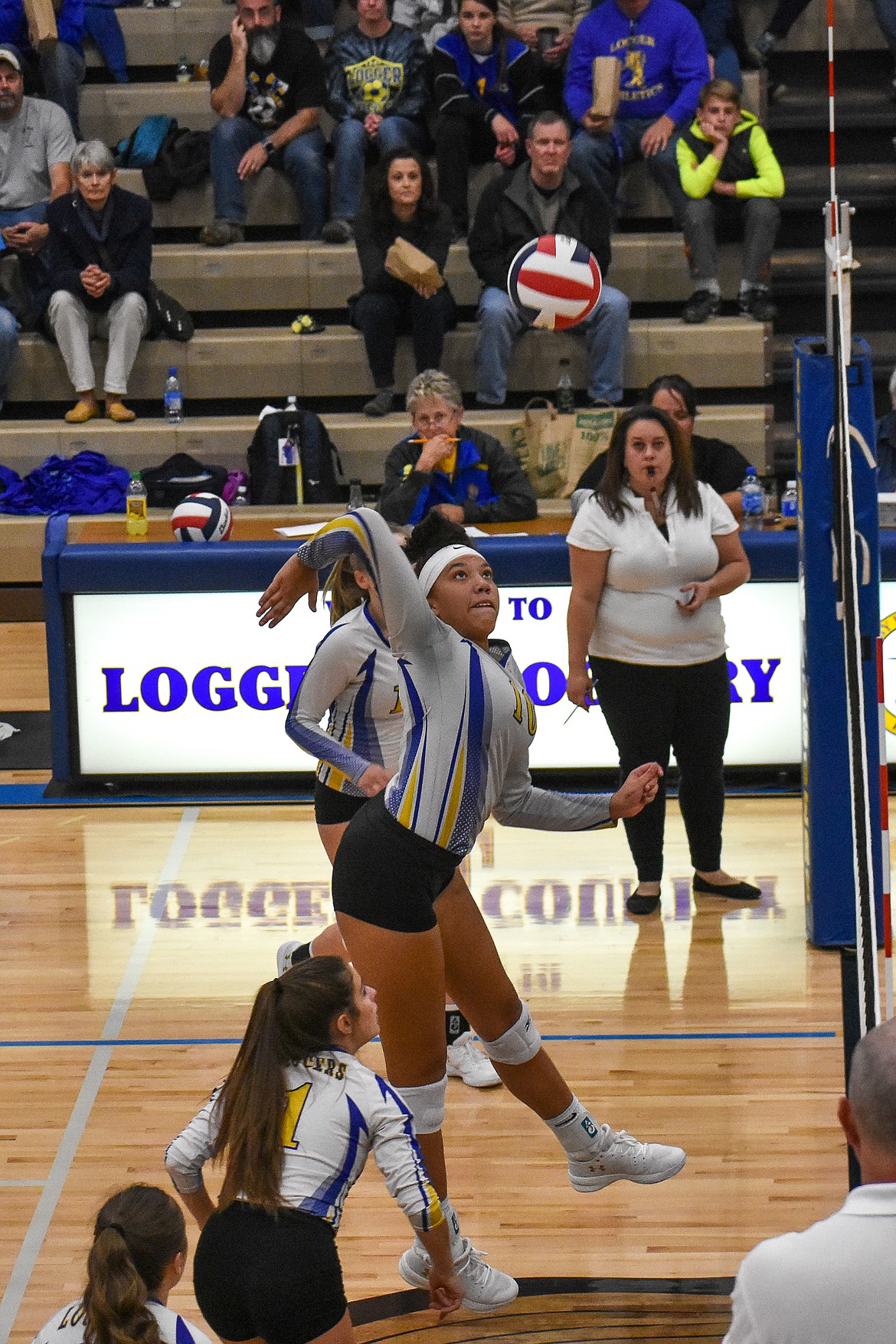 Libby senior Mehki Sykes goes for an attack during the first set of the Lady Loggers&#146; homecoming match against Browning Saturday. (Ben Kibbey/The Western News)
