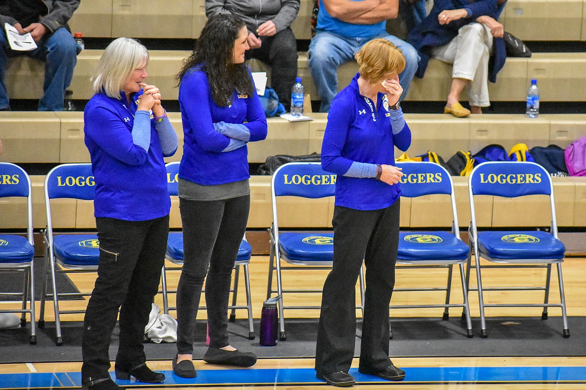 Libby Head Coach Cindy Ostrem-Johnston wipes tears away as her farewell to her senior players is read during senior night before the Lady Loggers&#146; game Saturday against Browning. (Ben Kibbey/The Western News)