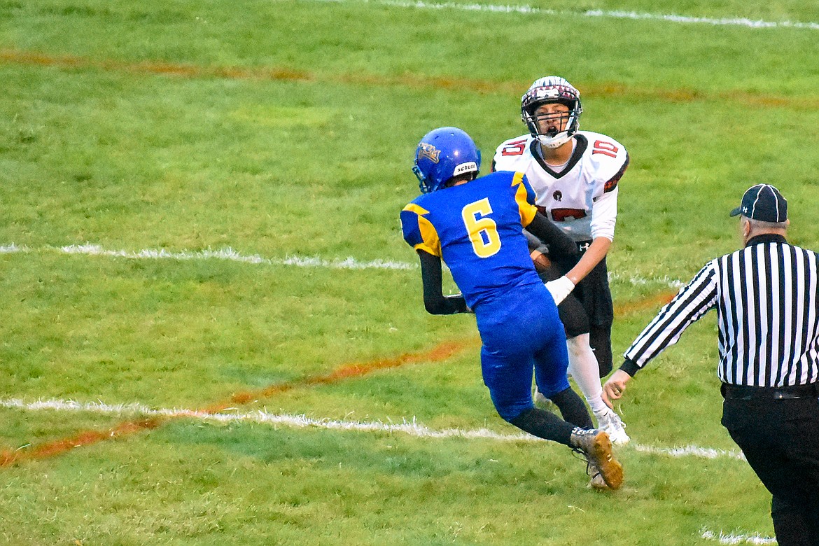 Libby junior quarterback Jeff Offenbecher heads into the end zone for the first touchdown of the Logger's 42-14 homecoming win over Browning Friday. (Ben Kibbey/The Western News)