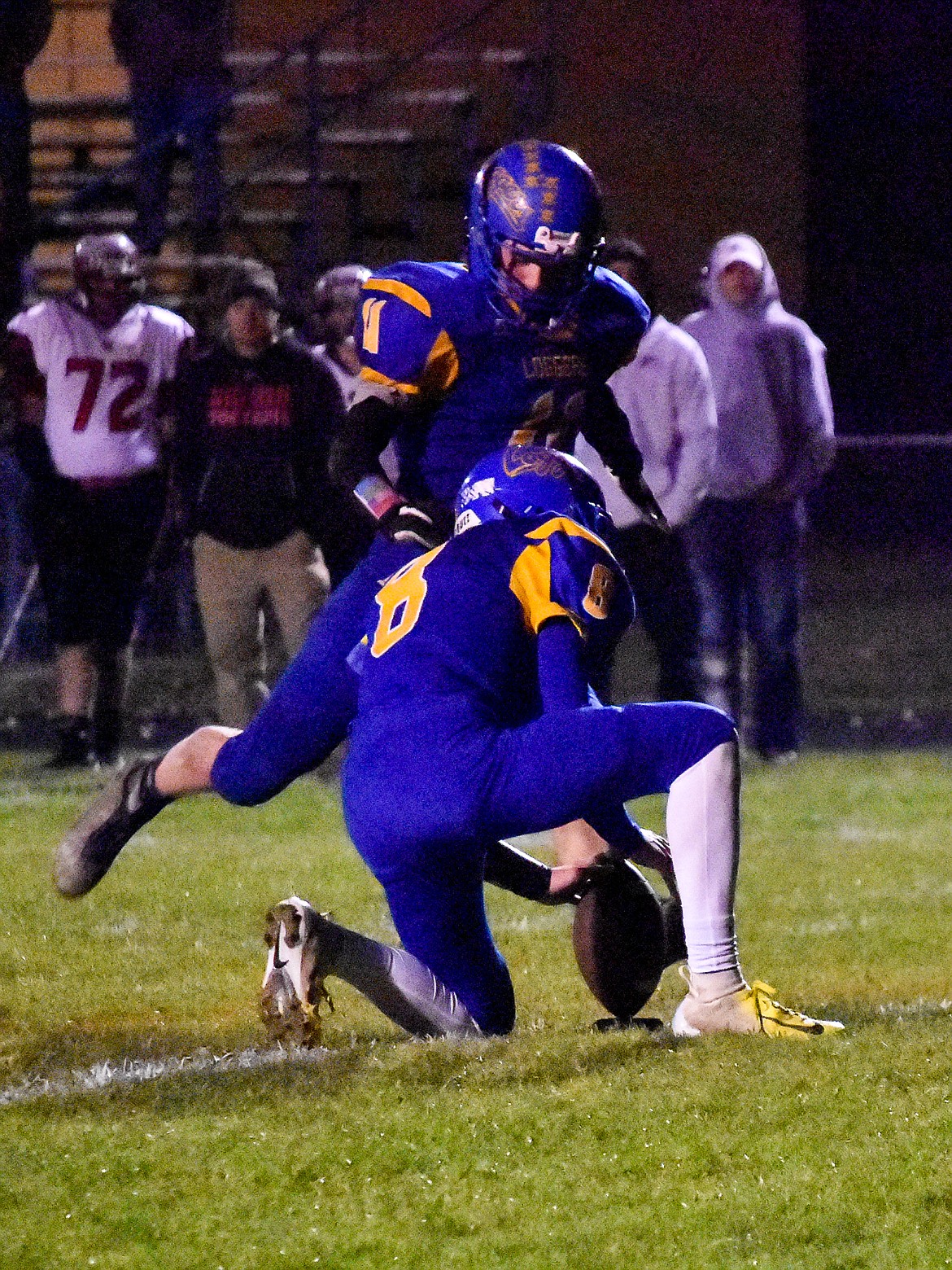 Libby junior kicker Chandler Bower kicks for the extra point after a touchdown by junior quarterback Jeff Offenbecher seconds from the end of the third quarter, making the score 28-14, Loggers, during Libby's 42-14 homecoming win over Browning Friday. (Ben Kibbey/The Western News)