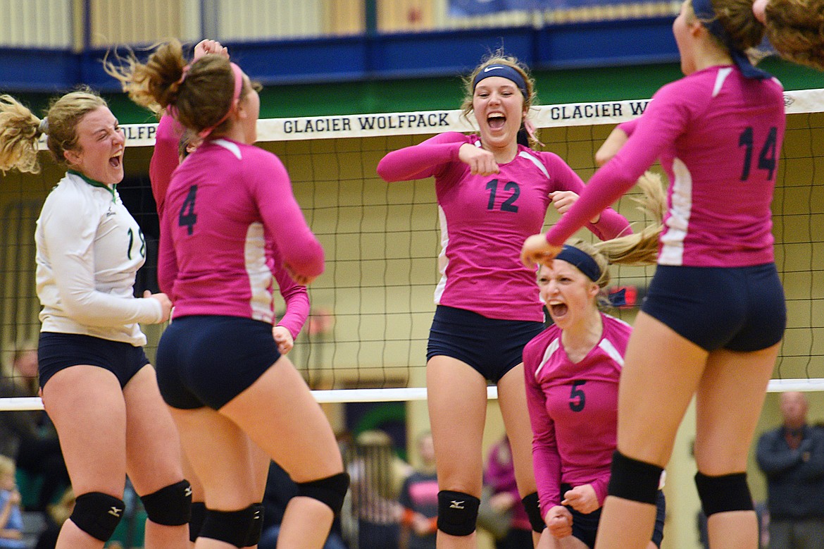 Glacier celebrates after a point against Flathead during crosstown volleyball at Glacier High School on Thursday. (Casey Kreider/Daily Inter Lake)