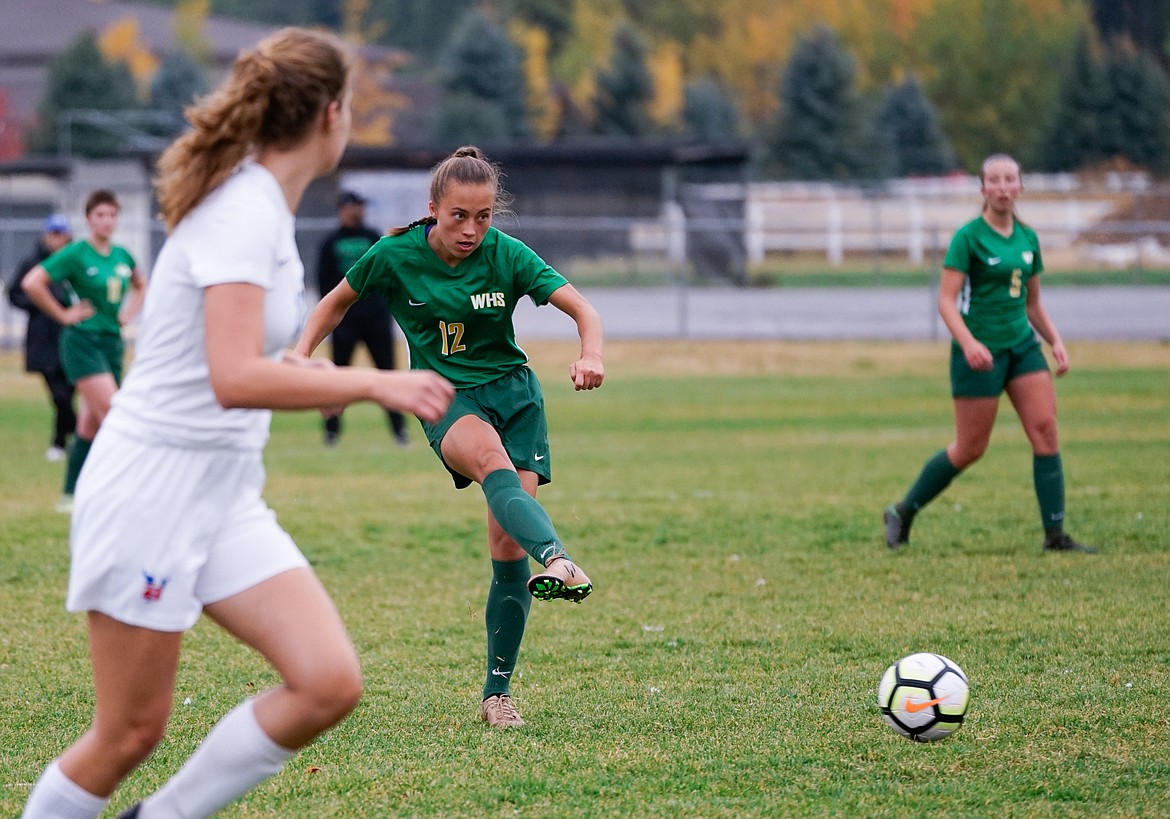 Anna Cook makes a pass against Bigfork last week at home. (Daniel McKay/Whitefish Pilot)