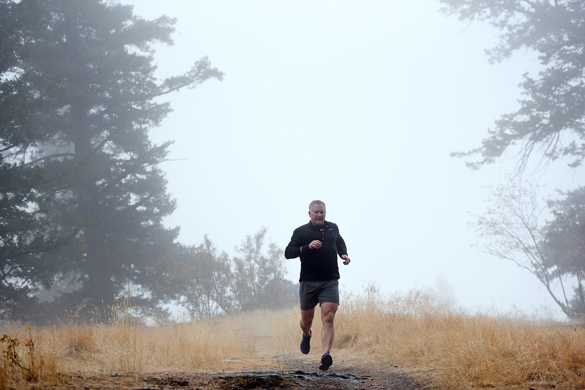 Robert Rigg, of Kalispell, goes for a run at Lone Pine State Park on Tuesday, Oct. 2. (Casey Kreider/Daily Inter Lake)