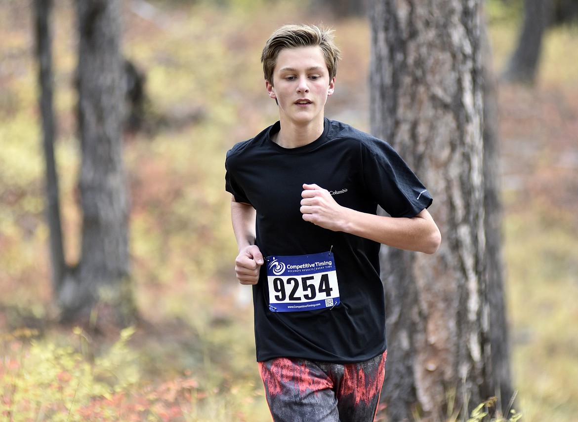 Aidan Calaway, 14, finished second for men in the 5K race during the Whitefish Trail Legacy Run Sunday morning. (Heidi Desch/Whitefish Pilot)