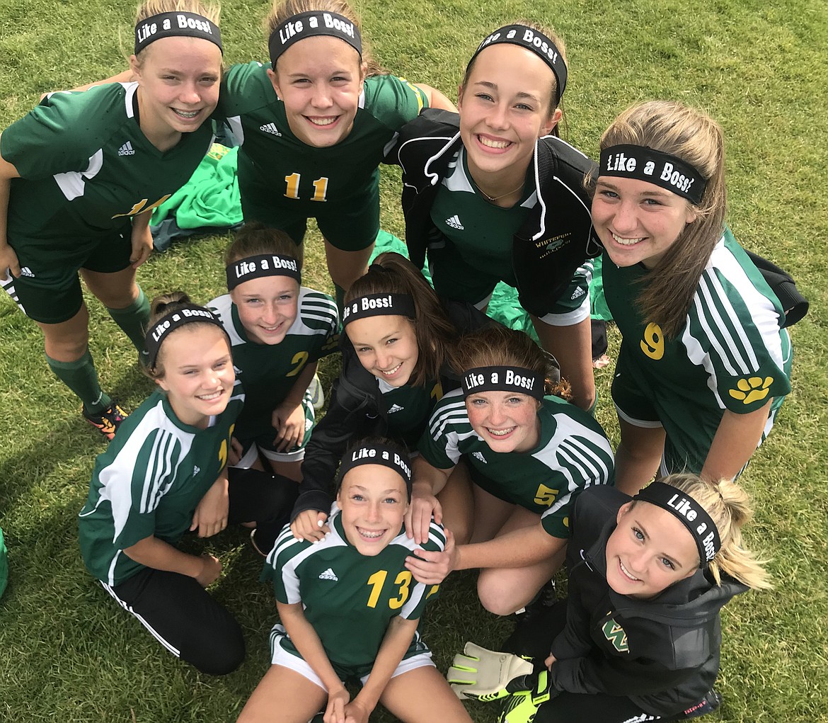 Some of coach Kelsey Whitby former players recently wore &#147;Like a Boss!&#148; headbands to honor her. (Photo courtesy Amy Olson)