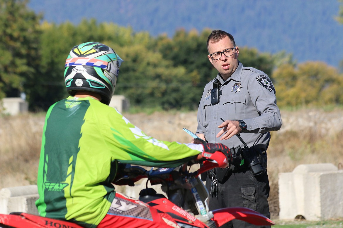 Photo by MANDI BATEMANDeputy Cobler gives instructions to a student.