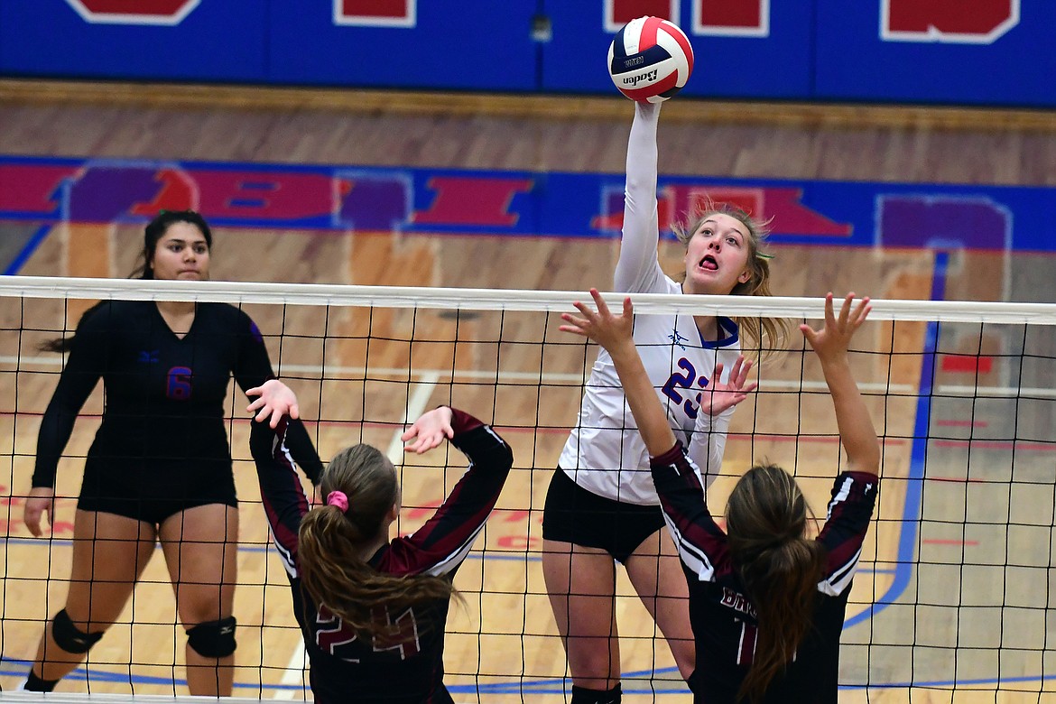 Ryley Kehr goes up for one of her five kills against Hamilton Saturday. Kehr and the Wildkats swept the Lady Broncs in three sets. (Jeremy Weber photo)