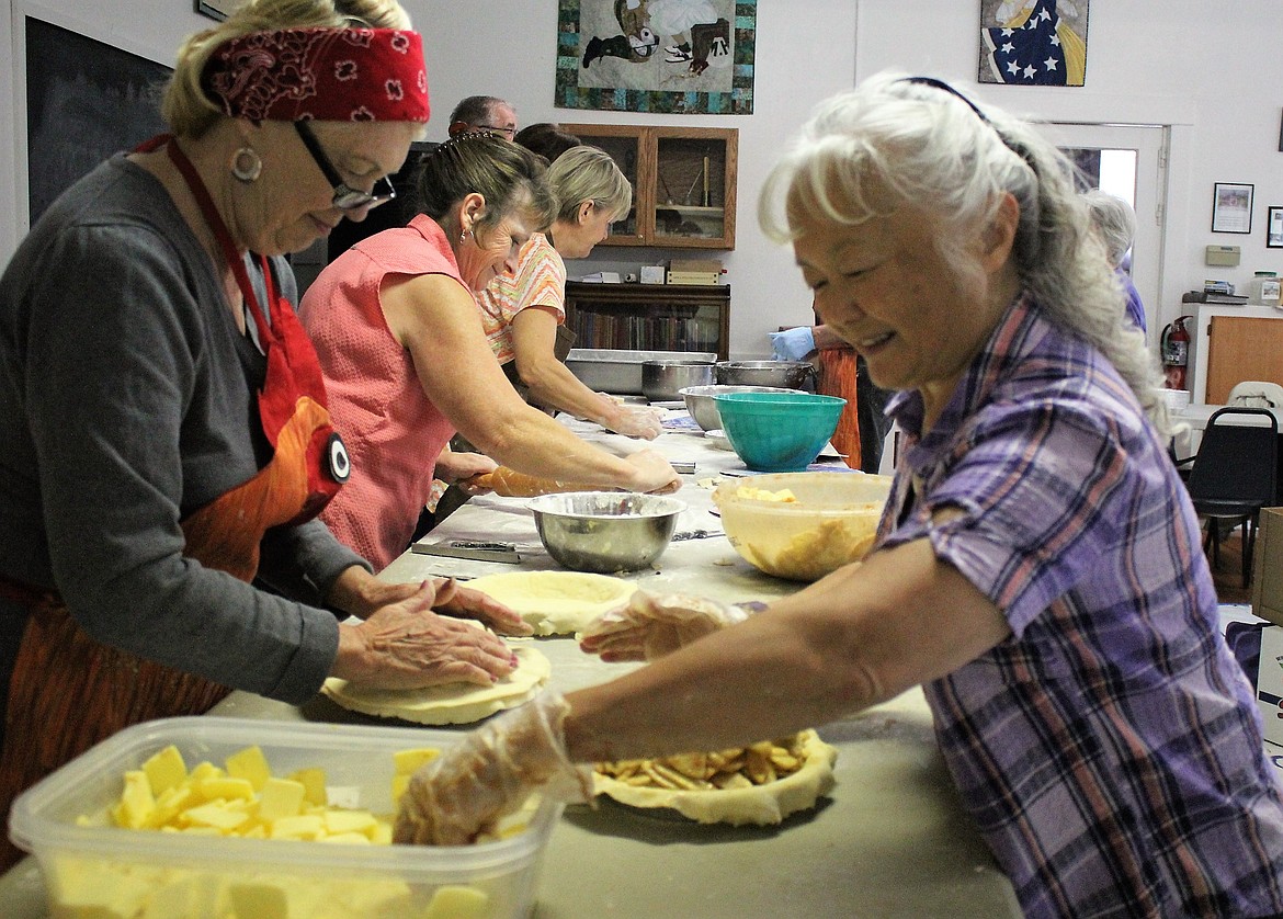 DeBorgia Historic School House Foundation members made more than 300 pies last week for their annual apple pie fundraiser for the school house.