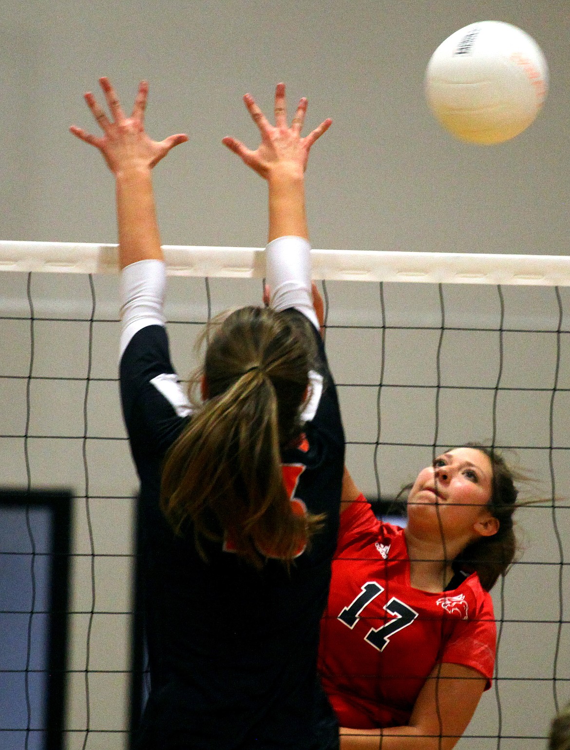 Rodney Harwood/For the Sun Tribune - Othello outside hitter Clarissa Martinez (17) pounds a ball down the line against an Ephrata defender during CWAC action in The Jungle.