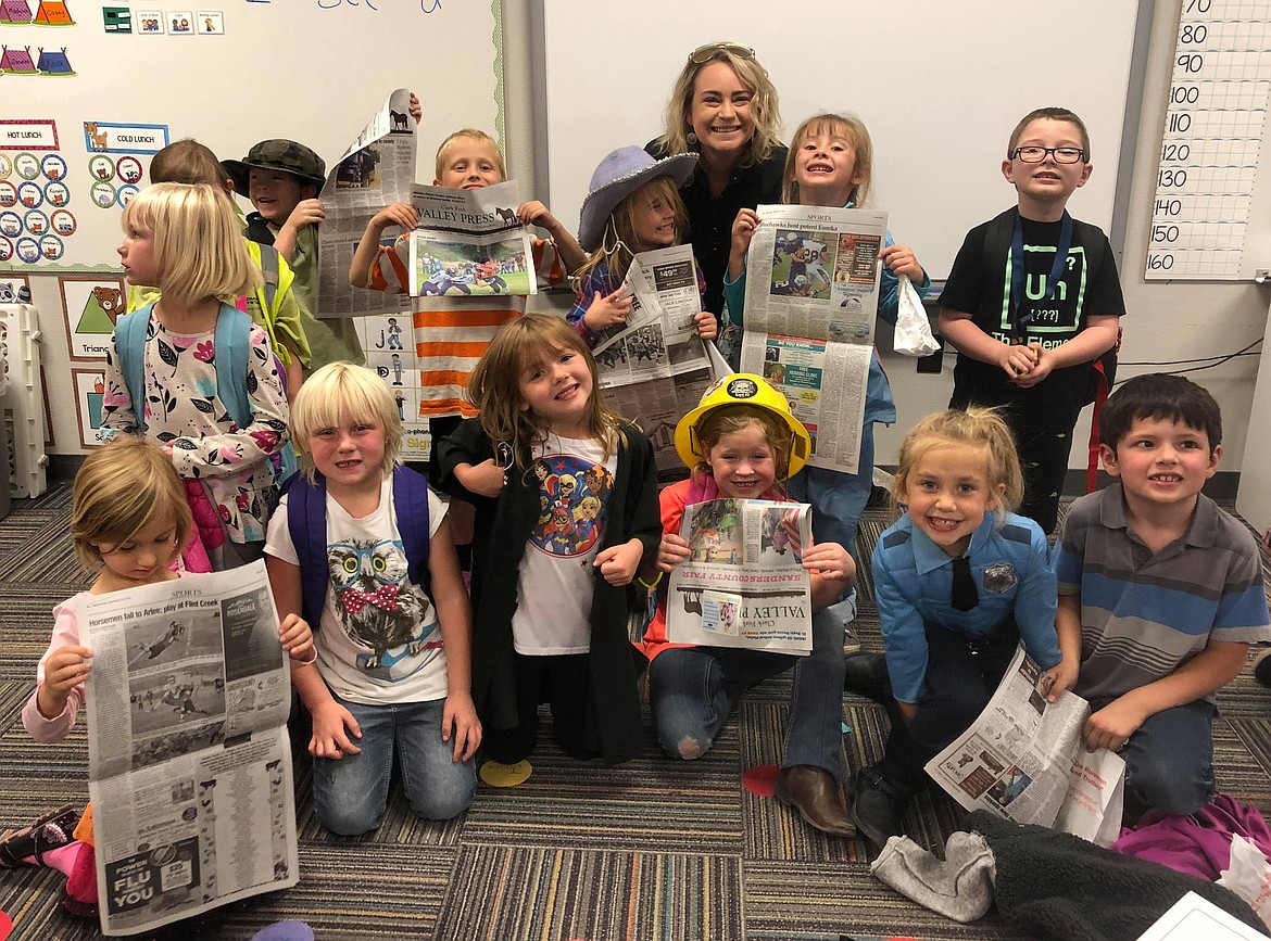 Valley Press reporter Erin Jusseaume with Ms. Hillerman&#146;s class after sharing the exciting job of being a reporter to all the kinder kids. (Photo provided)