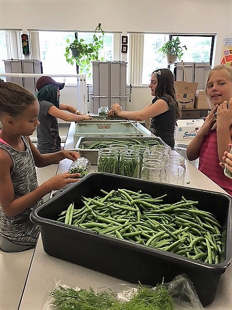 Growing and canning vegetables is only one of many projects and programs Superior Schools offers its students. These programs are part of the three pillars which won the school the 2018 Green Ribbon Award. (Photo courtesy of Superior School)