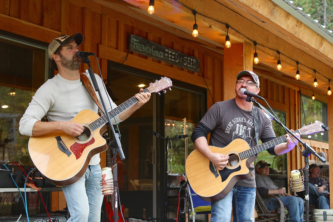 From left: Rusty Wood and Chris Sverdsten (collectively known as Sverwood) perform a mix of country and classic rock music at the event.