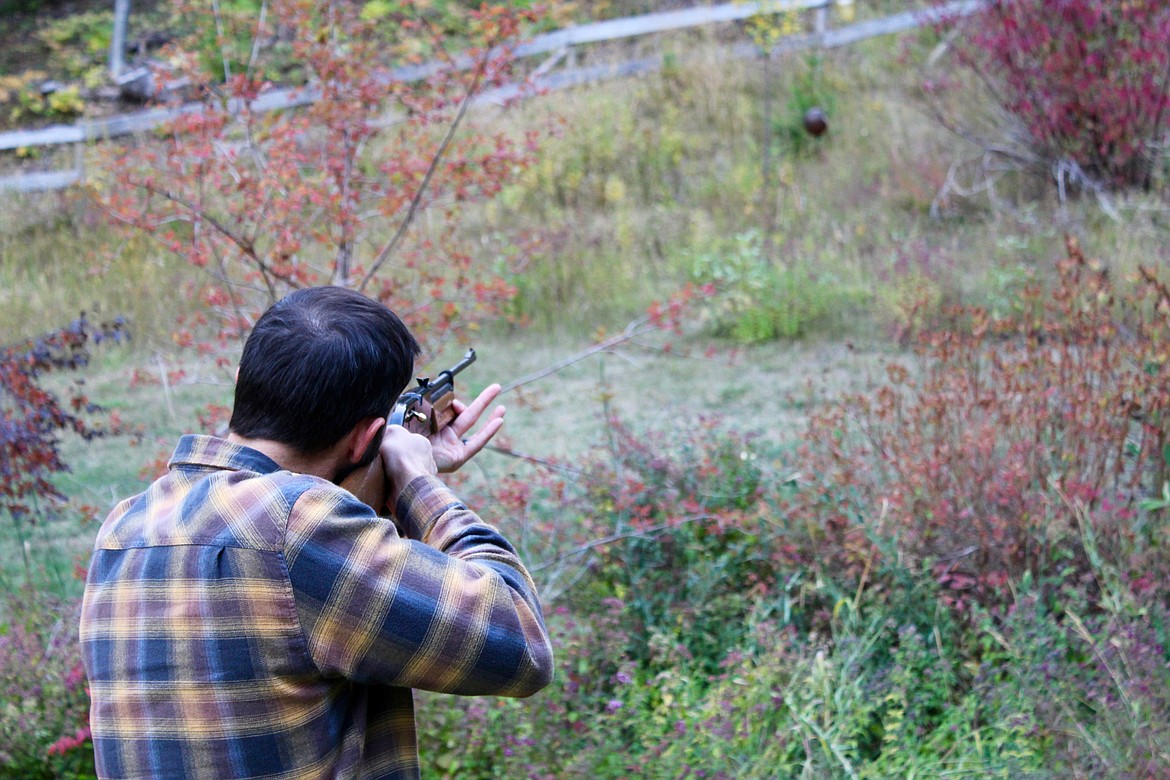 Chamber President Andy Waters tries his hand at the BB gun shooting range. Participants aimed at balloons and received a raffle ticket for every target hit. The grand prize was a Yeti brand cooler.