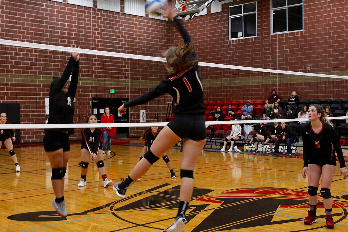 Photo by Chanse Watson
Catie Sheppard hits one across the net during a recent Wallace volleyball match.