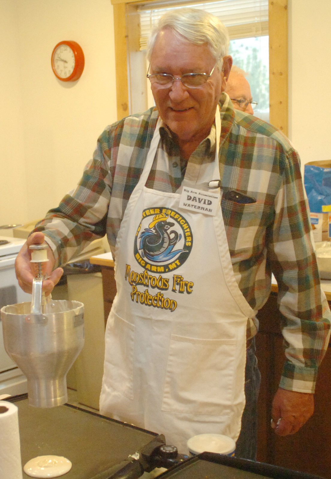 Big Arm Association Board of Directors member David Waterman was the pancake maker during the association&#146;s breakfast last Saturday. (Joe Sova/Lake County Leader)