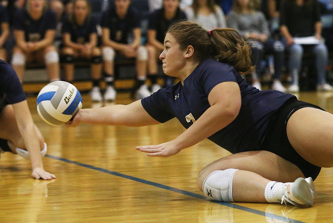 Timberlake&#146;s Kenzie Dean makes a diving play in the 3A District 1 championship match against Kellog High Thursday night at Timberlake High School. (LOREN BENOIT/Press)