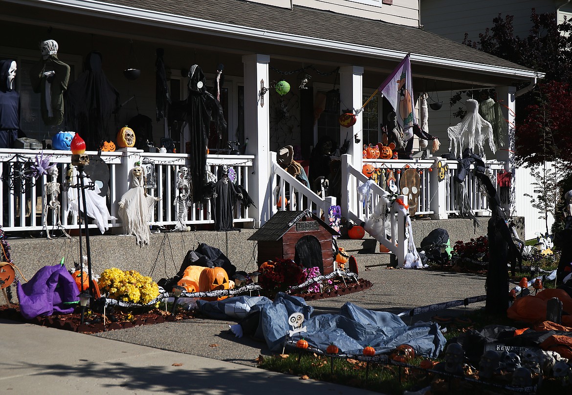 A variety of Halloween-themed decorations fill the lawn at this house on West Palais Drive in Coeur d'Alene. (LOREN BENOIT/Press)