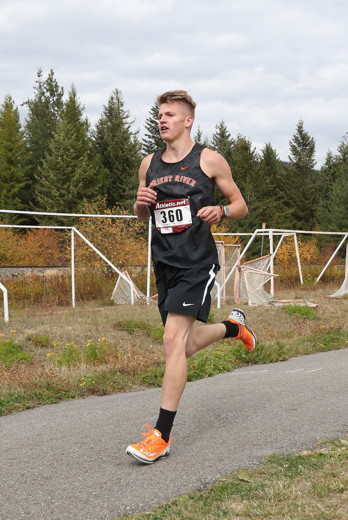 (Photo by ERIC PLUMMER)
Senior Jordan Phillips and the Spartan boys and girls cross country teams swept a recent meet in Kellogg.