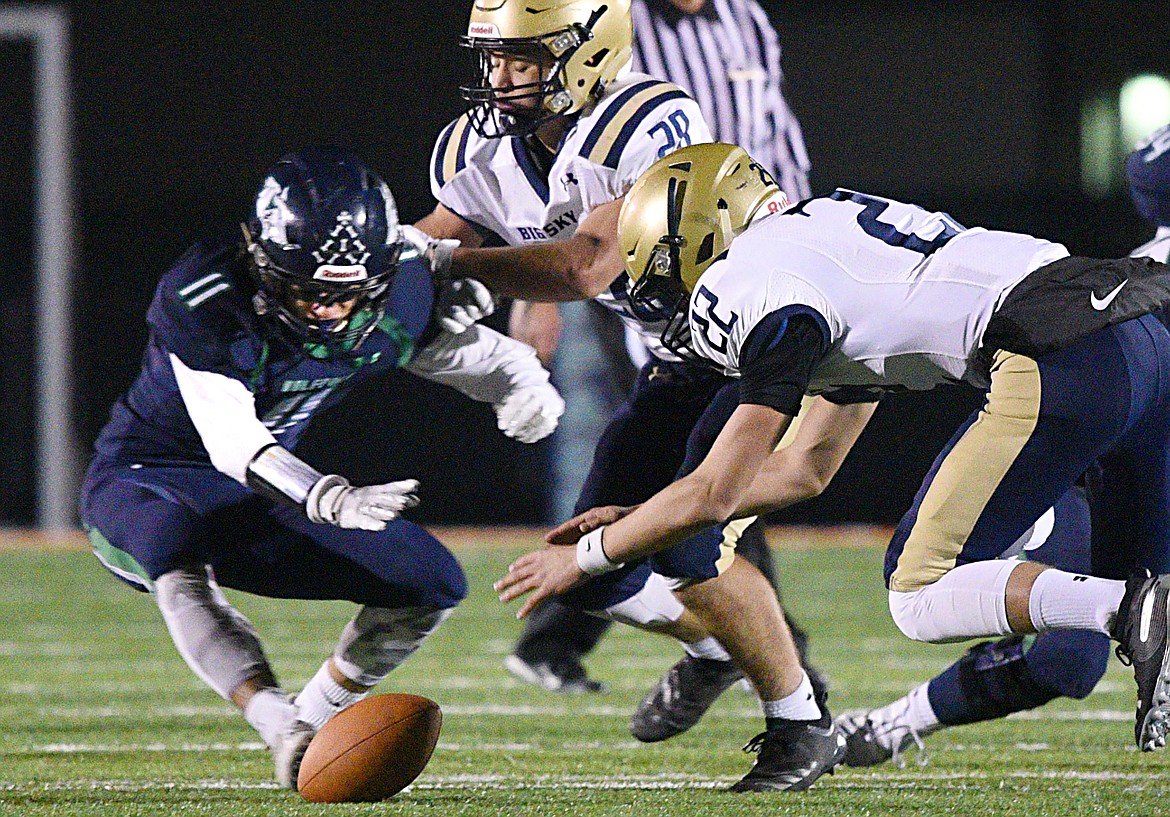 Glacier defensive back Gator Mostek (11) recovers a third-quarter fumble against Missoula Big Sky at Legends Stadium on Thursday. (Casey Kreider/Daily Inter Lake)