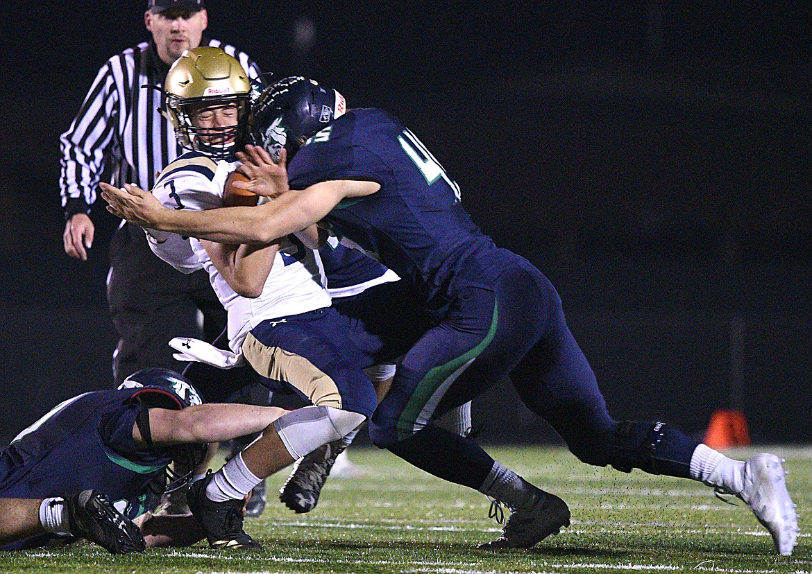 Glacier defensive lineman Ethan Baines (45) sacks Missoula Big Sky quarterback Draven Lincoln (3) in the second quarter at Legends Stadium on Thursday. (Casey Kreider/Daily Inter Lake)