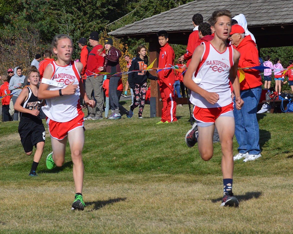 (Courtesy photo) 
Jett Longanecker, left, and Evan Dickson, right, have helped the Bullpup boys win every meet this season in a strong showing.