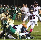 Quincy goes down slugging against Ellensburg