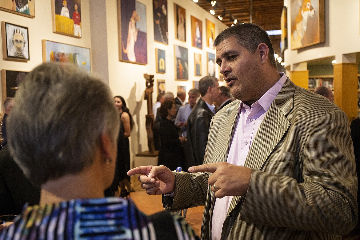 LOREN BENOIT/Press
Prize-winning author Adam Johnson speaks with Mary Sanderson about his book, &#147;The Orphan Master&#146;s Son,&#148; at a private reception at Art Spirit Gallery before speaking at the 15th annual North Idaho Distinguished Humanities Lecture at The Coeur d&#146;Alene Resort.