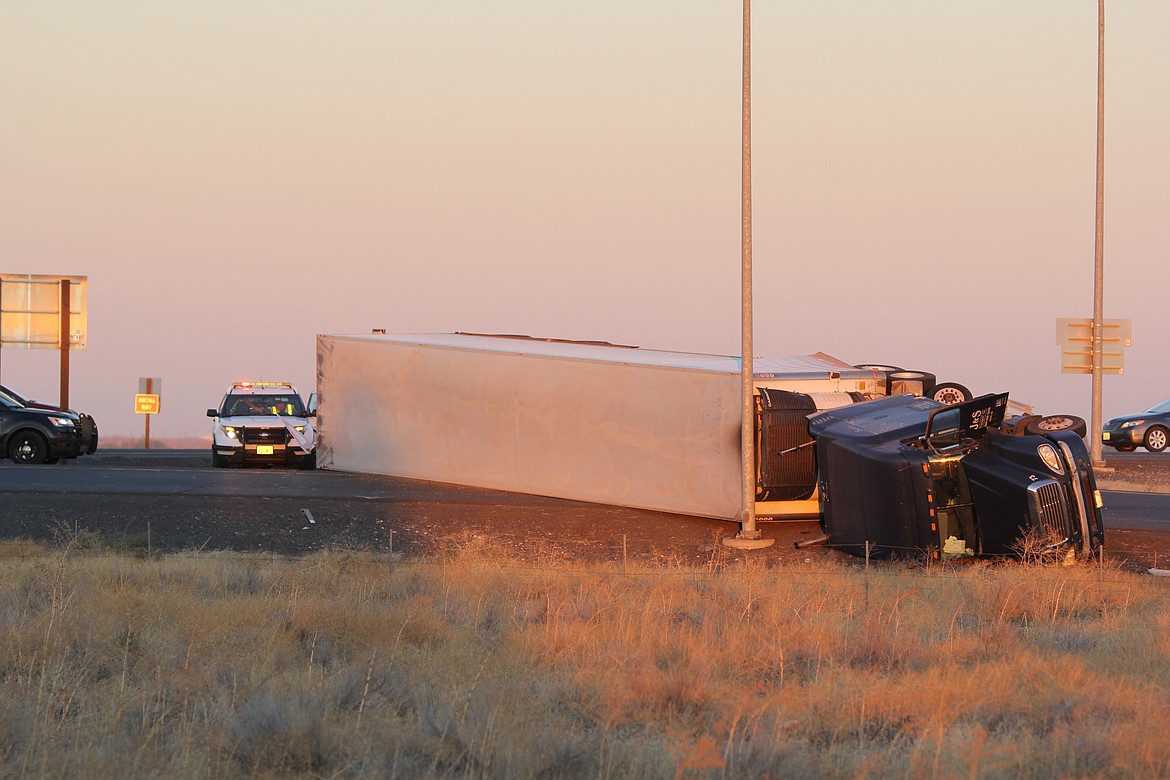 Emry Dinman/Columbia Basin Herald
A semi that rolled onto its side at around 5:30 p.m. Monday at the intersection of SR-17 and Interstate 90 partially blocked the westbound on-ramp to the federal highway, according to Washington State Patrol officials.