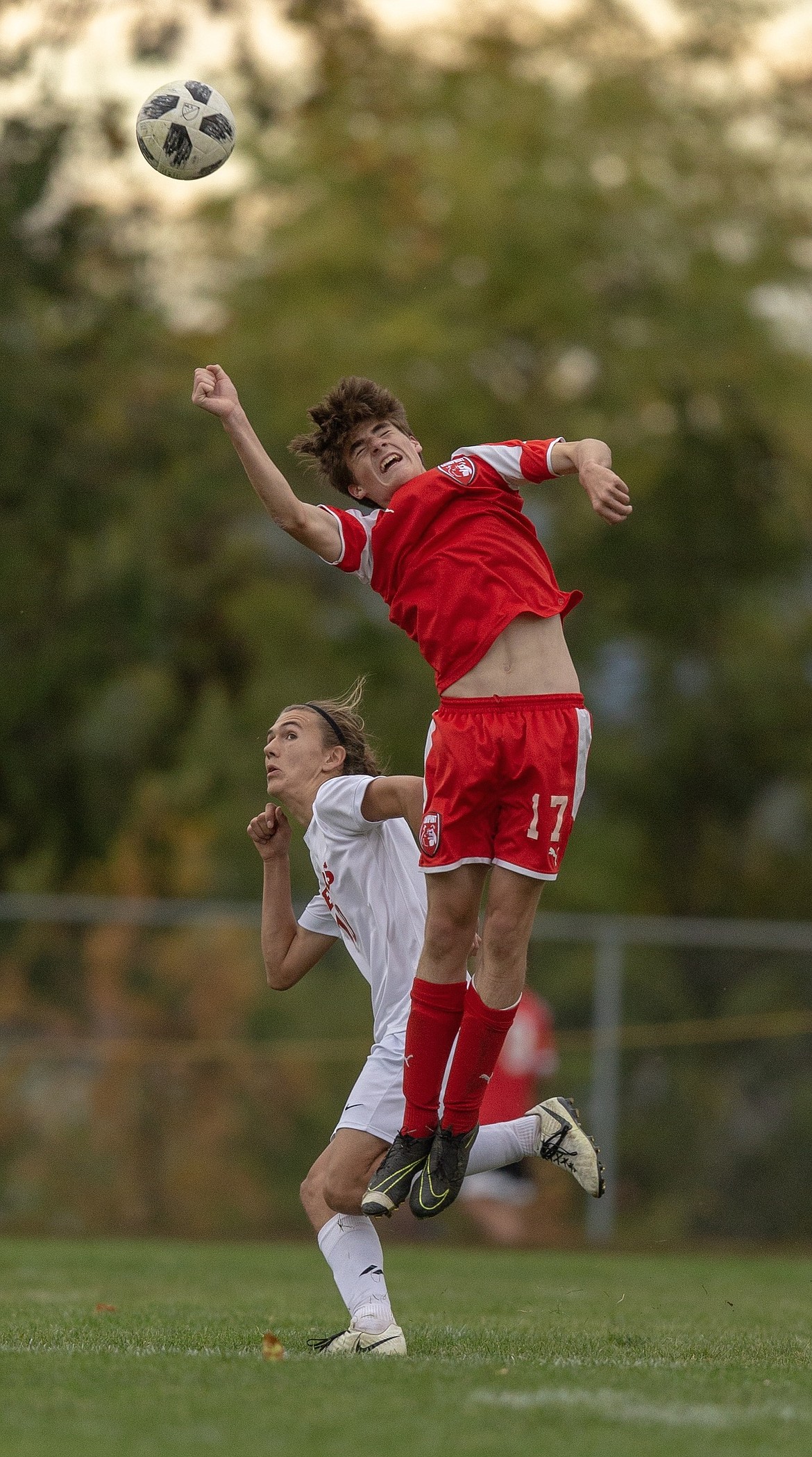 (Photo by JASON DUCHOW PHOTOGRAPHY)
Junior Teigen Edmundson plays a ball out of the air in the district championship at War Memorial Field.