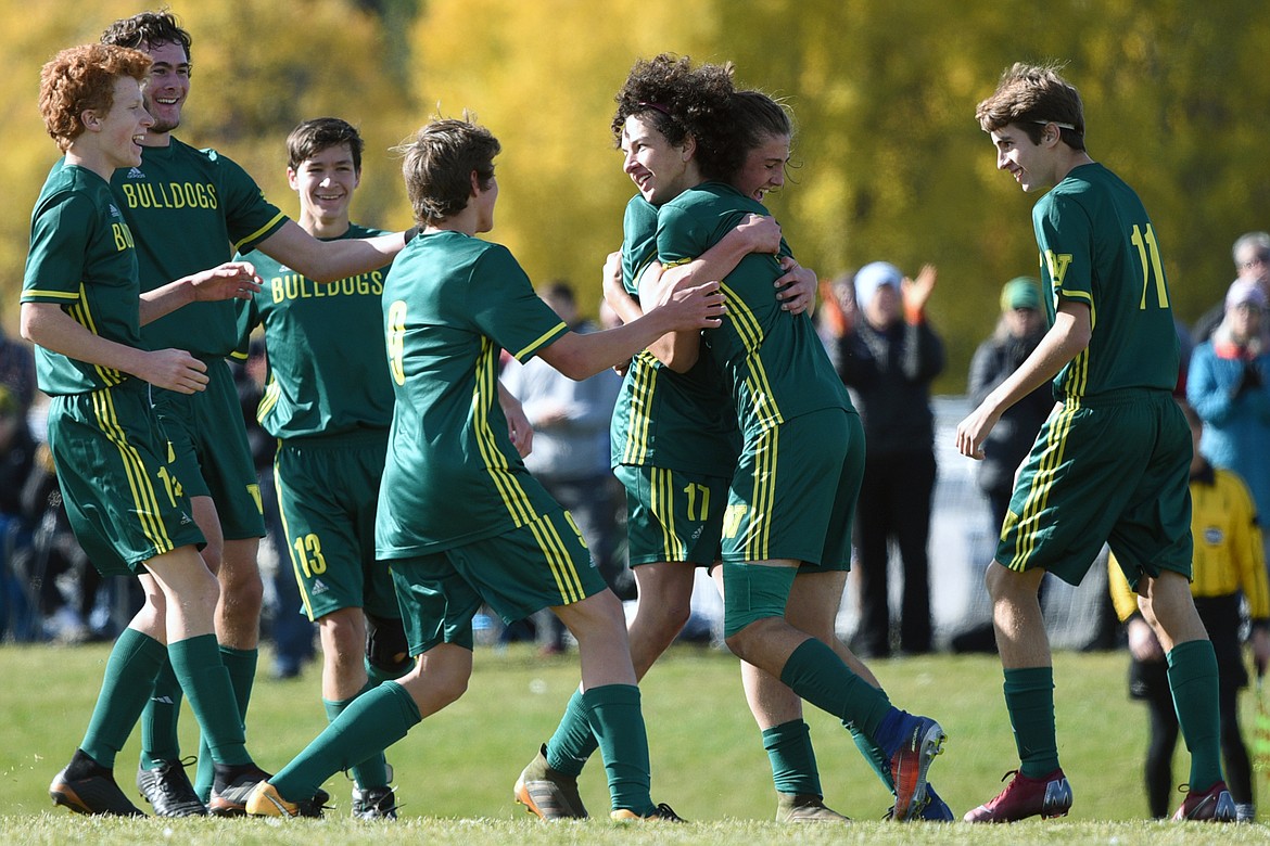 Whitefish celebrates after a goal by Ammann Koch-Ford (4, second from right) in the first half against Livingston at Smith Fields in Whitefish on Saturday. (Casey Kreider/Daily Inter Lake)